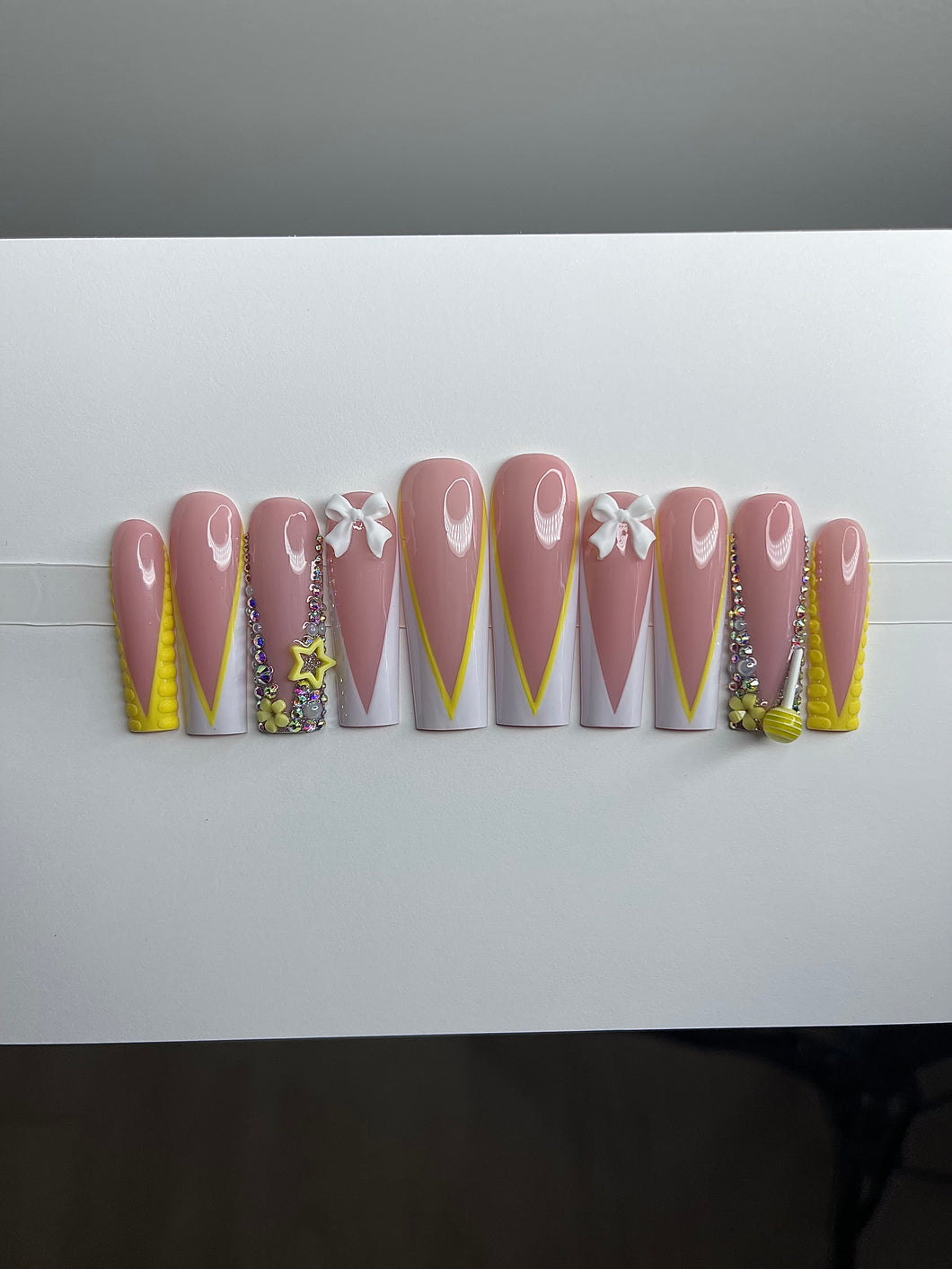 Yellow V-Tip Nails
